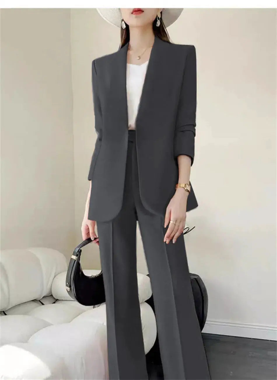 Women's gray two-piece pantsuit with blazer and wide-leg pants, office-ready commuter style
