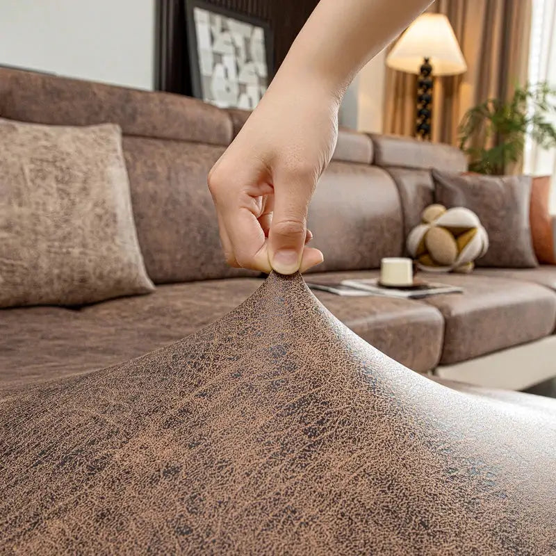 Elastic stretch sofa cover by Simples Market in brown, removable pet-friendly furniture protector
