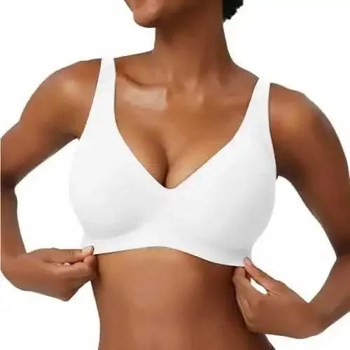 Women's seamless white wireless bra with full cups; soft, breathable support