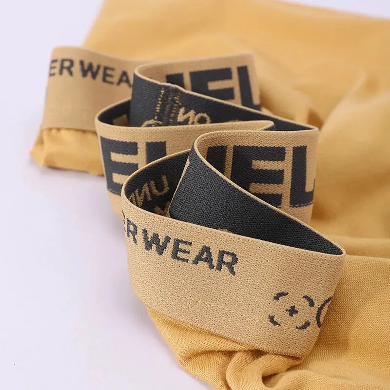 5-pack men's boxer shorts with beige elastic waistbands and black logo bands