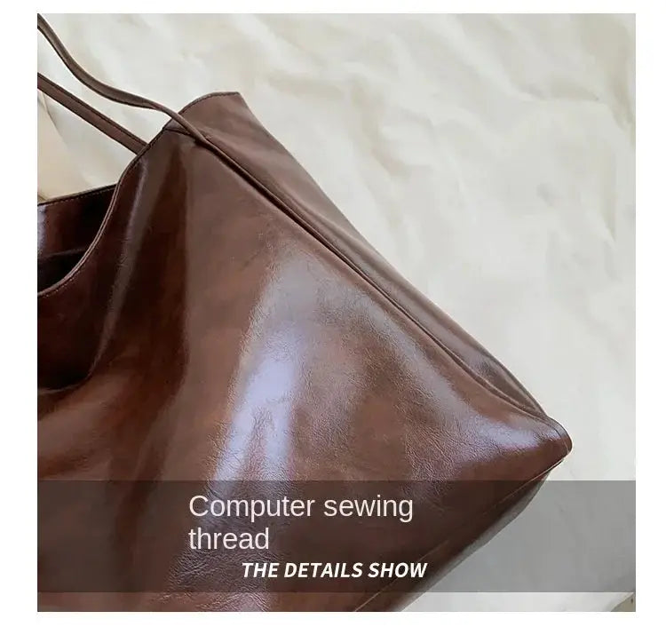 Women tote bag in brown PU leather with soft finish and top handles
