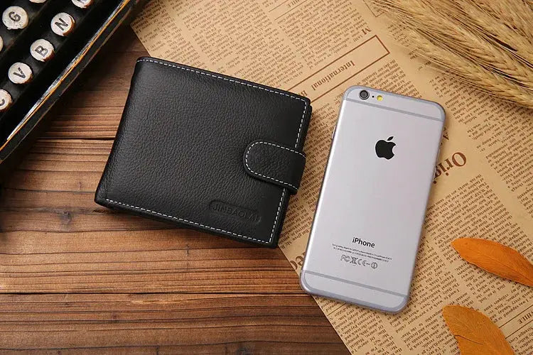 Men's black genuine leather wallet with snap strap and white stitching