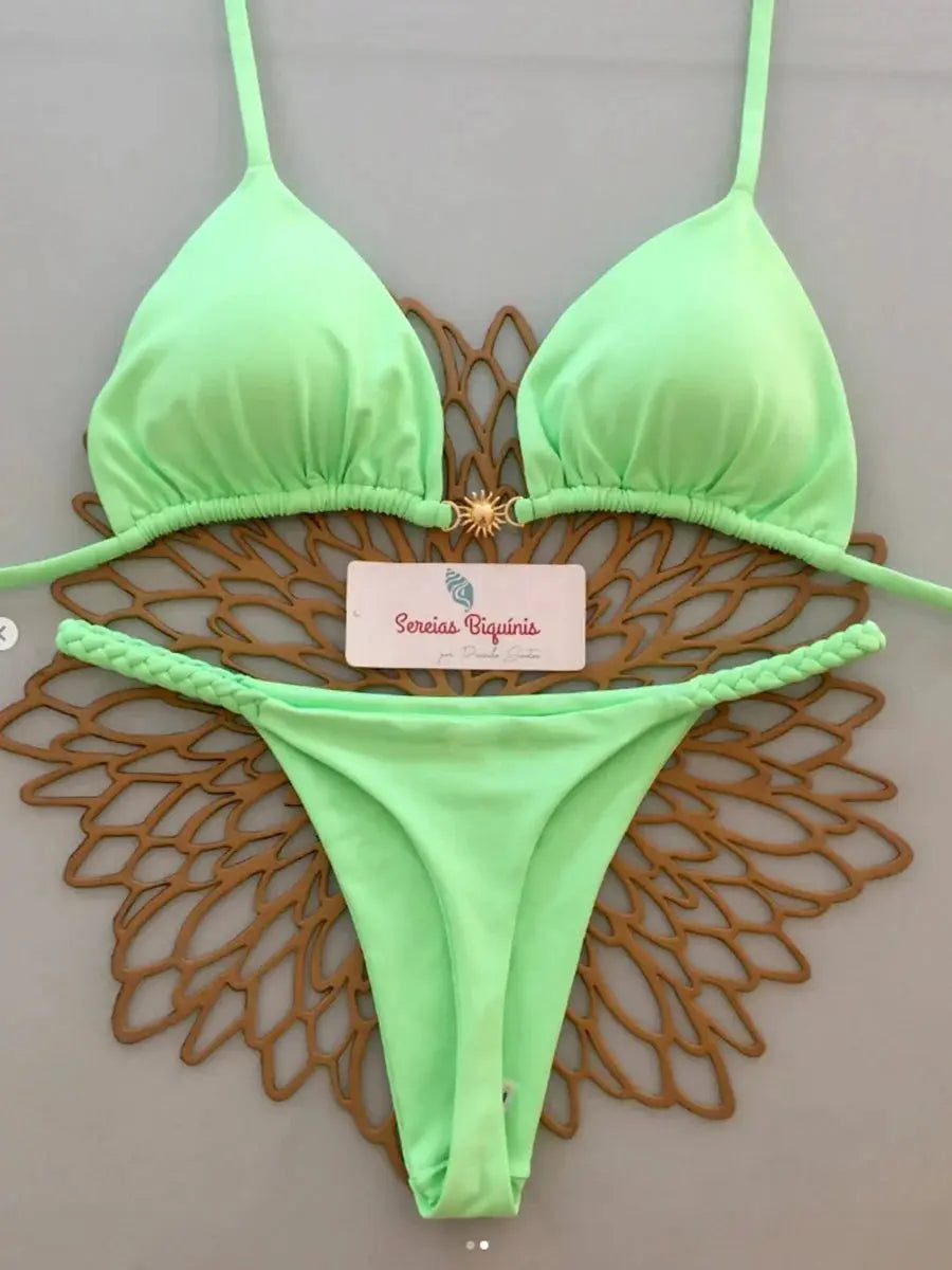 Micro bikini set in neon green with halter top and thong bottoms; braided side straps, Sereias Biquinis tag visible