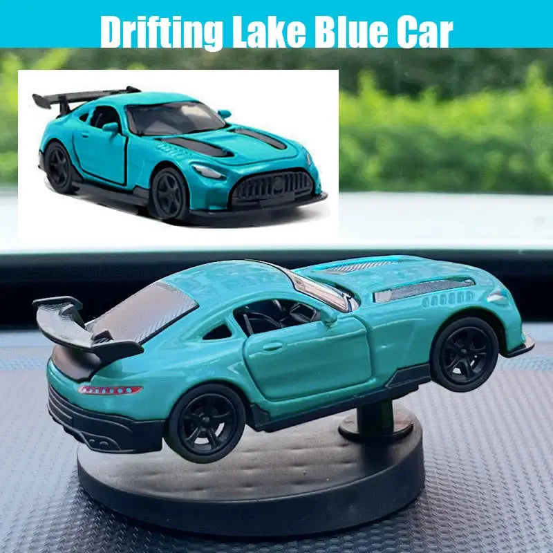 Turquoise drift car toy model with black wheels and rear spoiler on display stand
