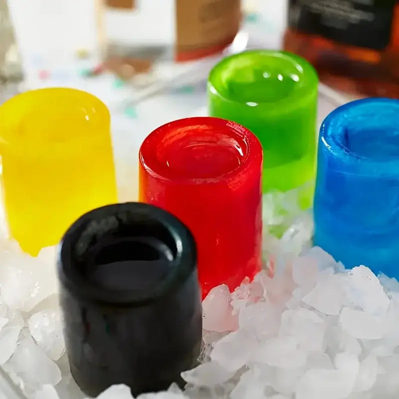 Simples Market silicone ice cube mold with four holes; round cup-shaped ice blocks in assorted colors.