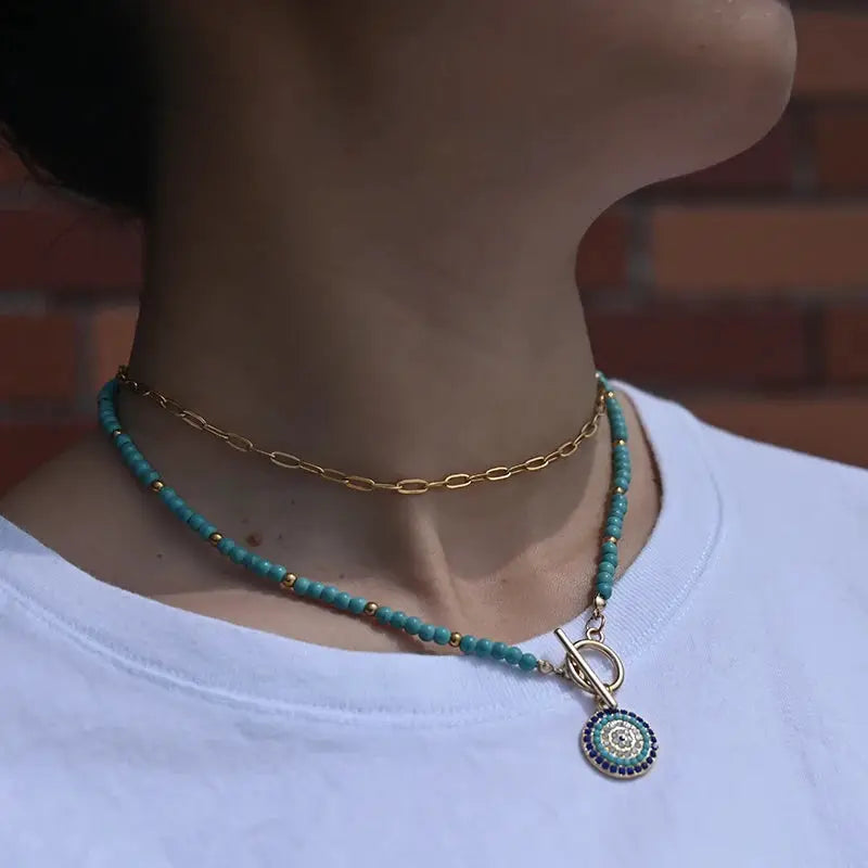 Turquoise 4mm stone two-layer choker necklace with gold chain and round evil charm pendant