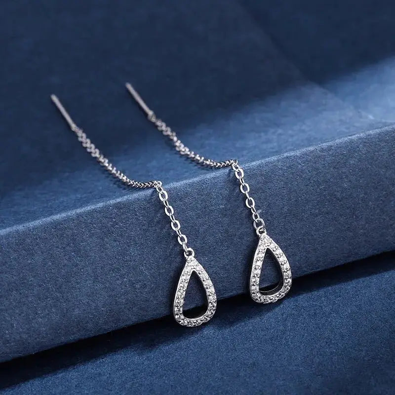 Silver-tone drop earrings with long wire chain and pavé teardrop pendants (pair)