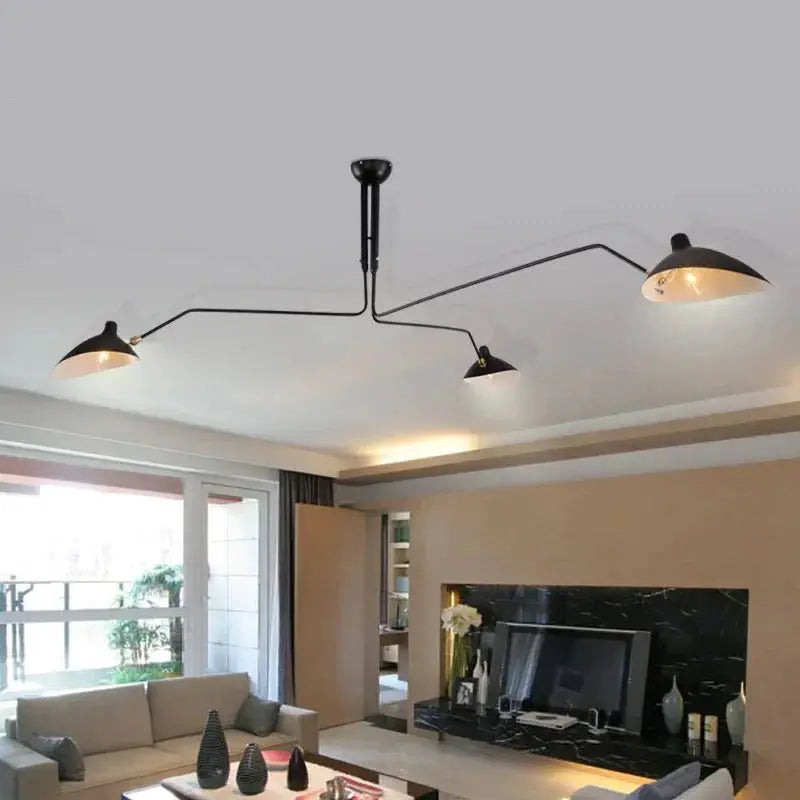 Modern Spider Grabbing Pendant Light by Simples Market, black metal with three lampshades for living room