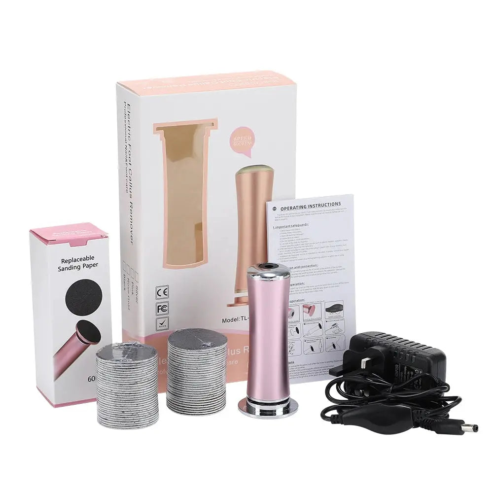 Simples Market electric foot callus remover with pink rose-gold body, two replacement sanding discs, and charger.