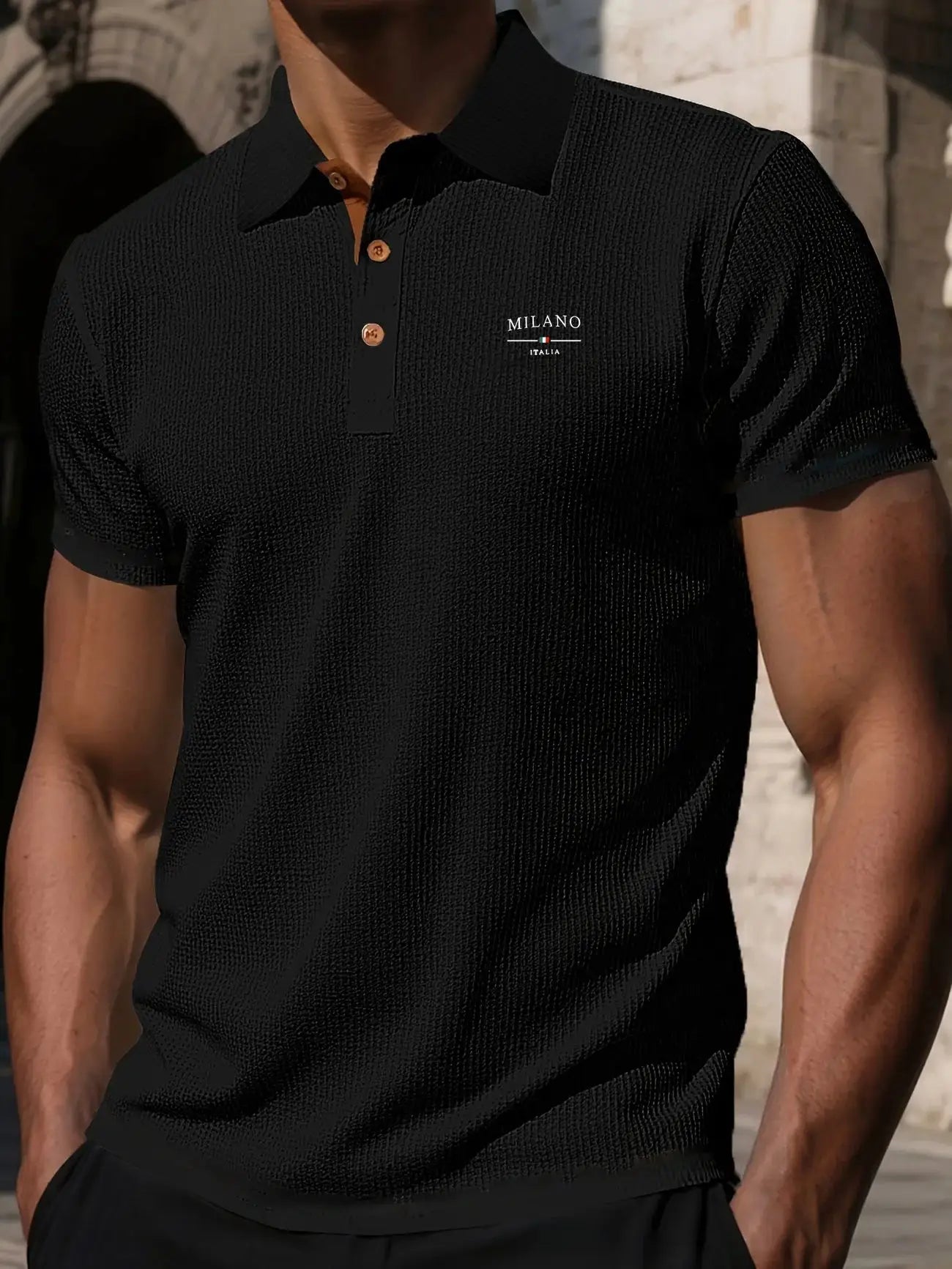 Men's black short-sleeved polo shirt with Milano Italia logo on chest