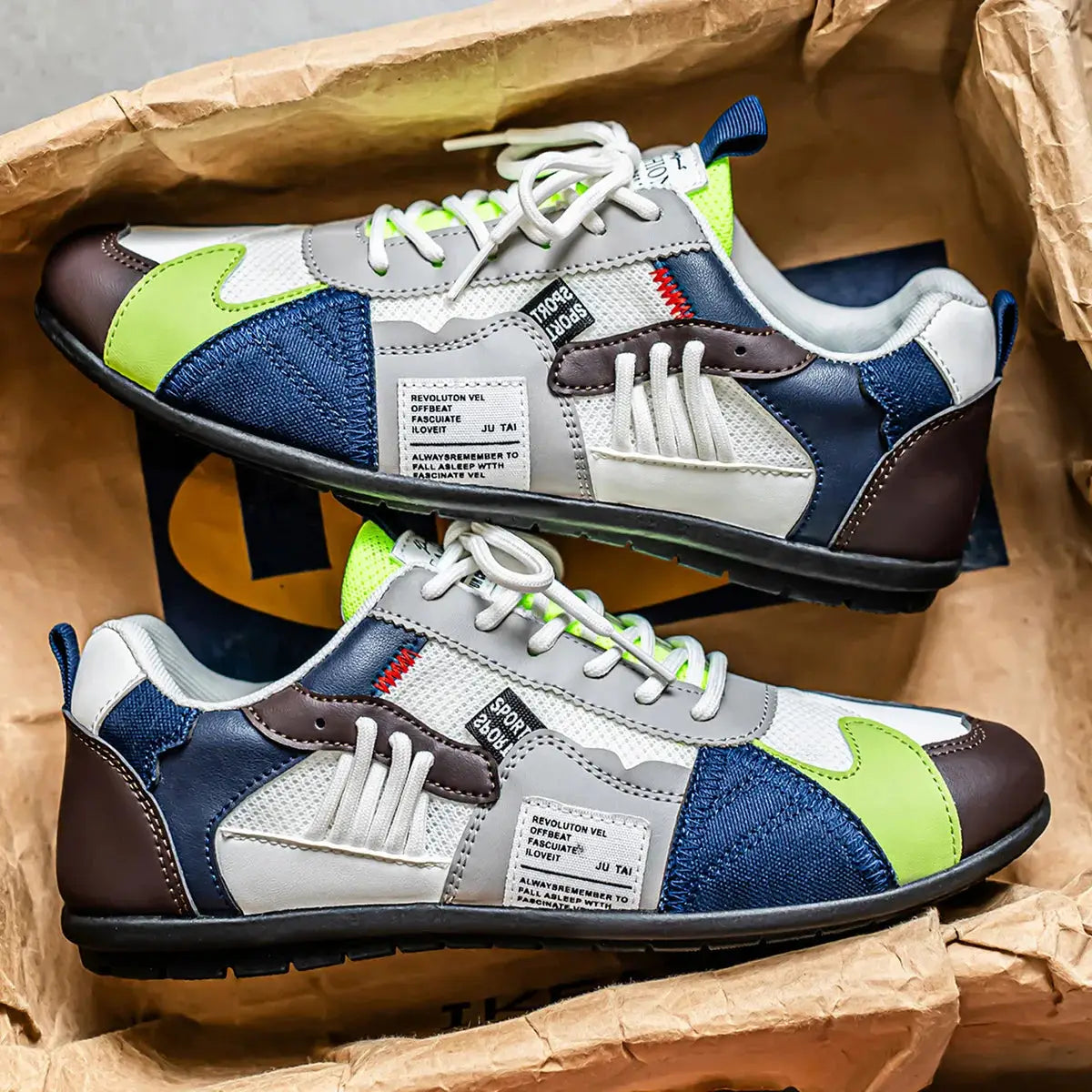 Pair of men's casual outdoor sneakers by Simples Market in blue denim, neon lime accents, white and grey panels