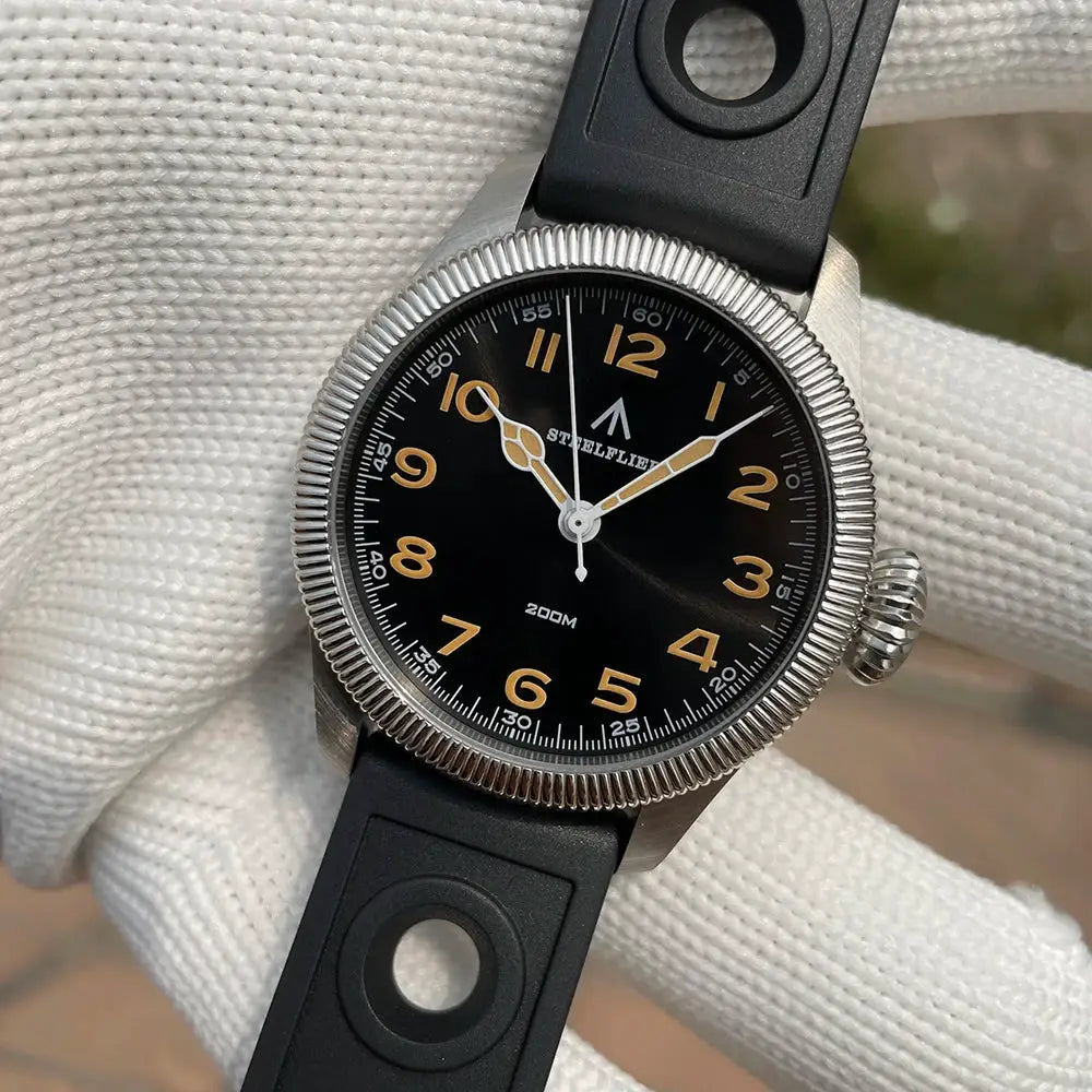 Steelflier SF741 wristwatch, black dial with beige numerals, stainless steel case, rubber strap