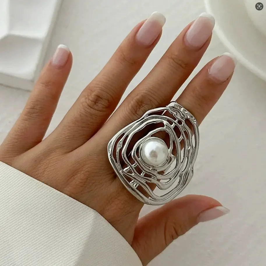 Ring, silver-tone punk metal with irregular three-layer open frames and pearl centerpiece
