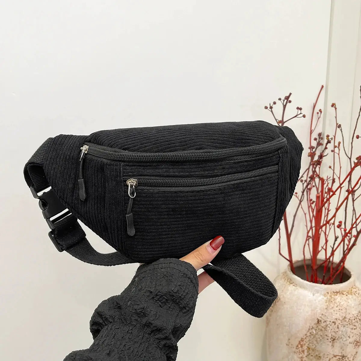Corduroy waist bag by Simples Market in black with dual zip pockets and adjustable strap.