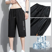 Men's black AIKEN athletic shorts with elastic waist, zip pockets, quick-dry fabric