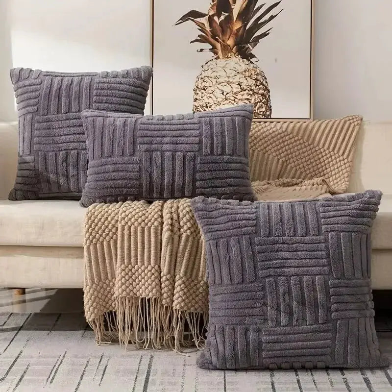 Throw pillow covers, boho faux-fur plush with textured gray and cream geometric pattern on sofa