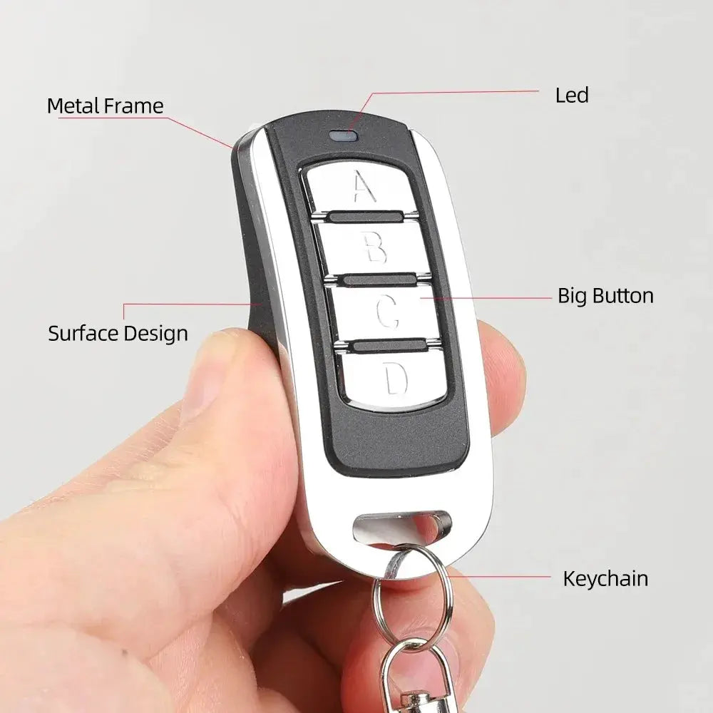 4-in-1 multi-frequency garage gate remote duplicator keychain with metal frame and four A/B/C/D buttons Simples Market