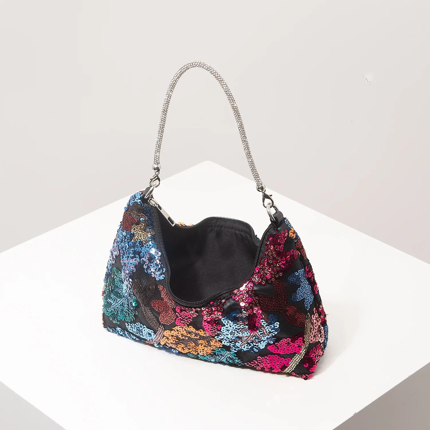 Shoulder bag by Simples Market with multicolor floral sequin pattern and silver chain strap