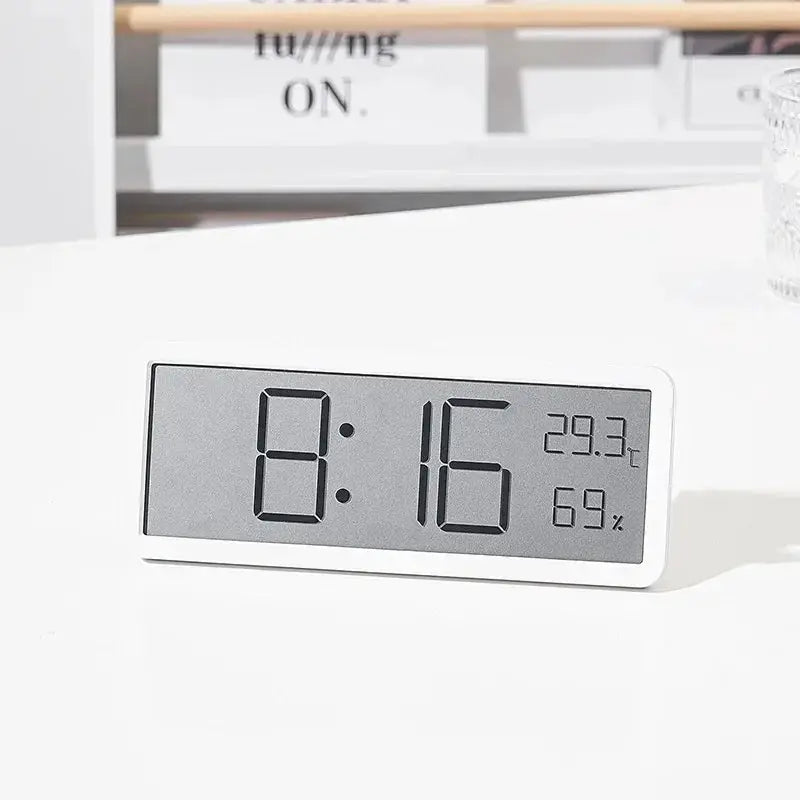 Simples Market white LCD digital desk clock displaying 8:16, 28.3°C and 69% humidity