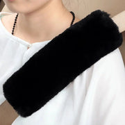 Car seat belt cover shoulder warmer pad in black faux fur for car interior