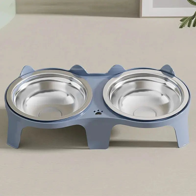 Dual stainless steel pet bowls on a light-blue anti-tip stand for cats and dogs