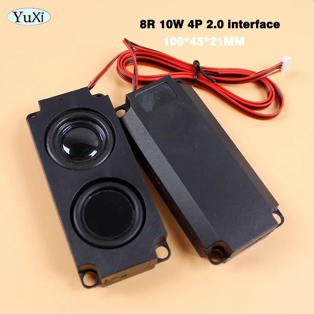 Pair of black rectangular PC speakers with red and black wiring; YuXi logo visible on the units.