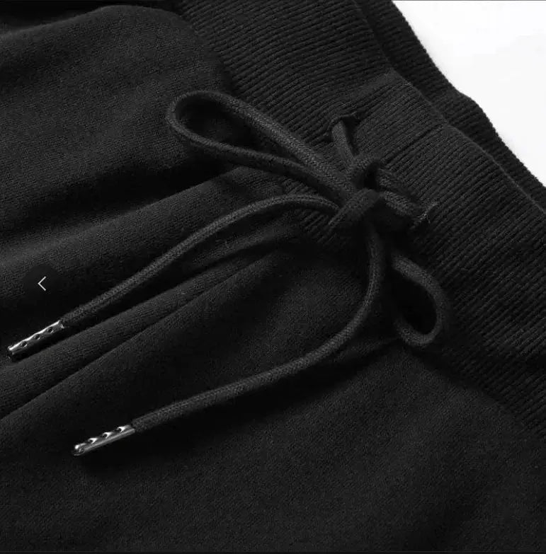 Men's black 100% cotton shorts with drawstring waistband and metal-tipped aglets