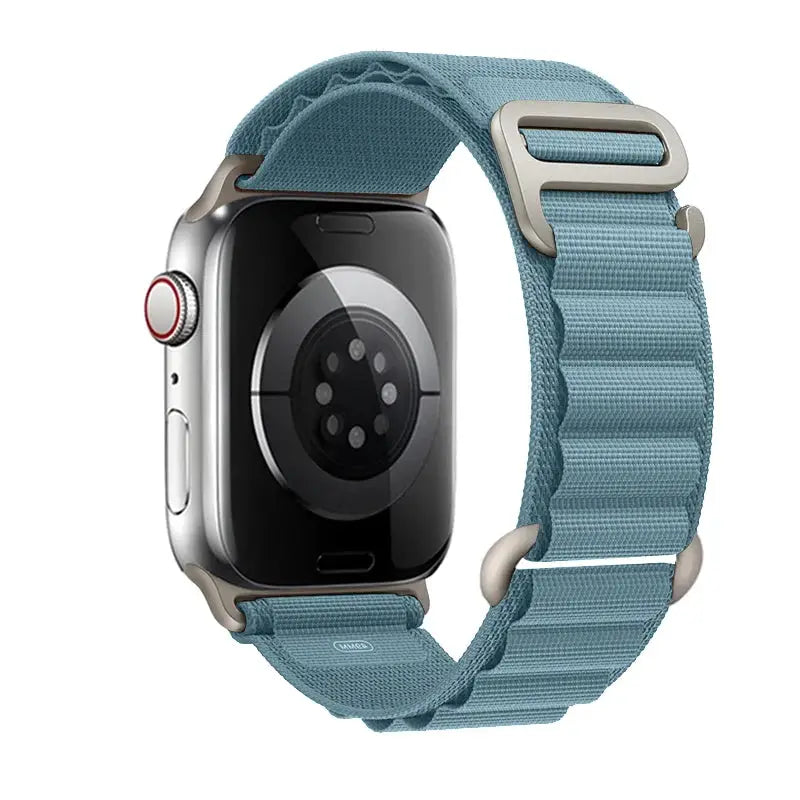 Apple Watch nylon Alpine band in blue by Simples Market, adjustable strap for 40–49mm models.