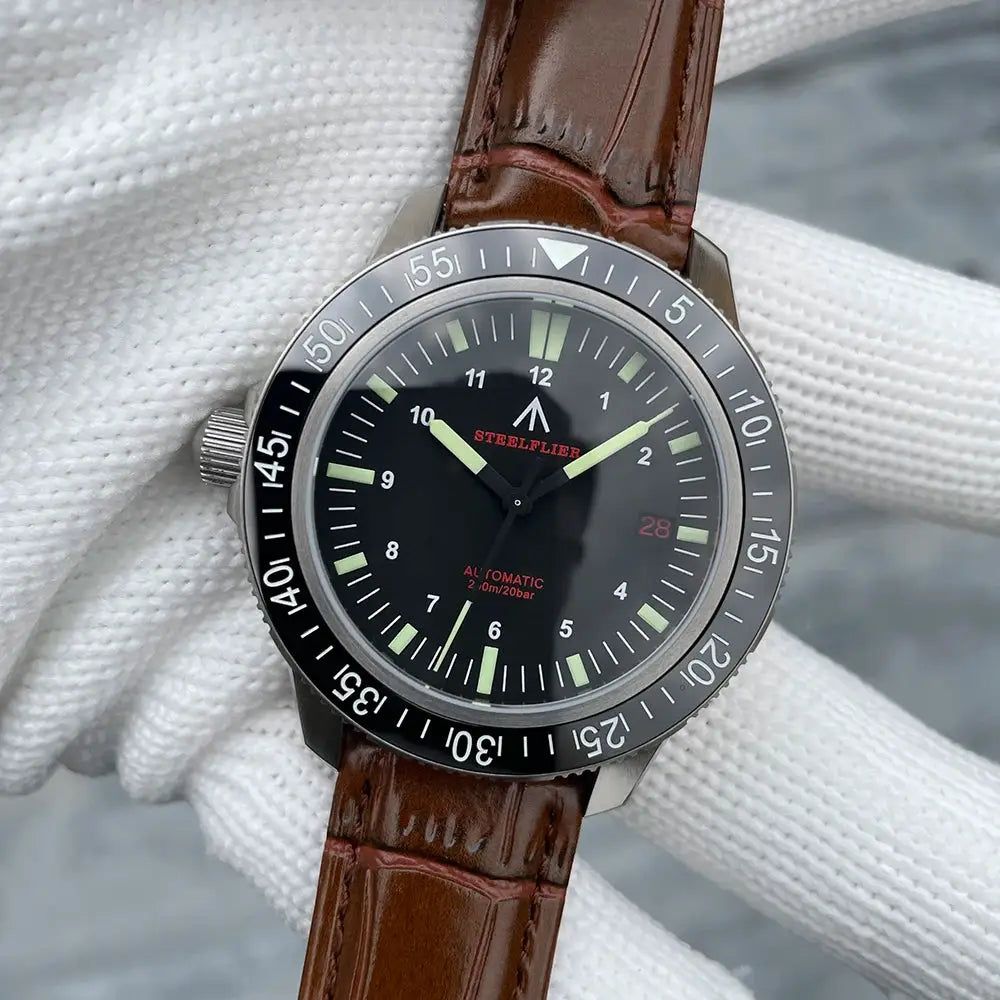Steelflier SF783 automatic dive watch with black dial, ceramic bezel, luminous hands, red date window, brown leather strap