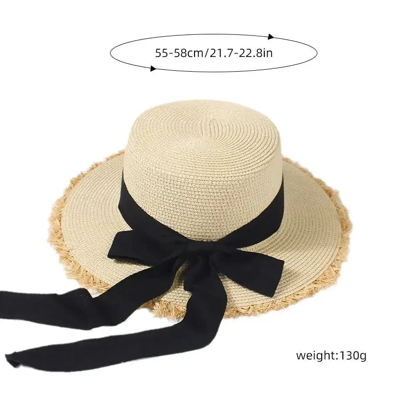 Korean Bow Straw Hat for Women with wide beige frayed-edge brim and black ribbon bow