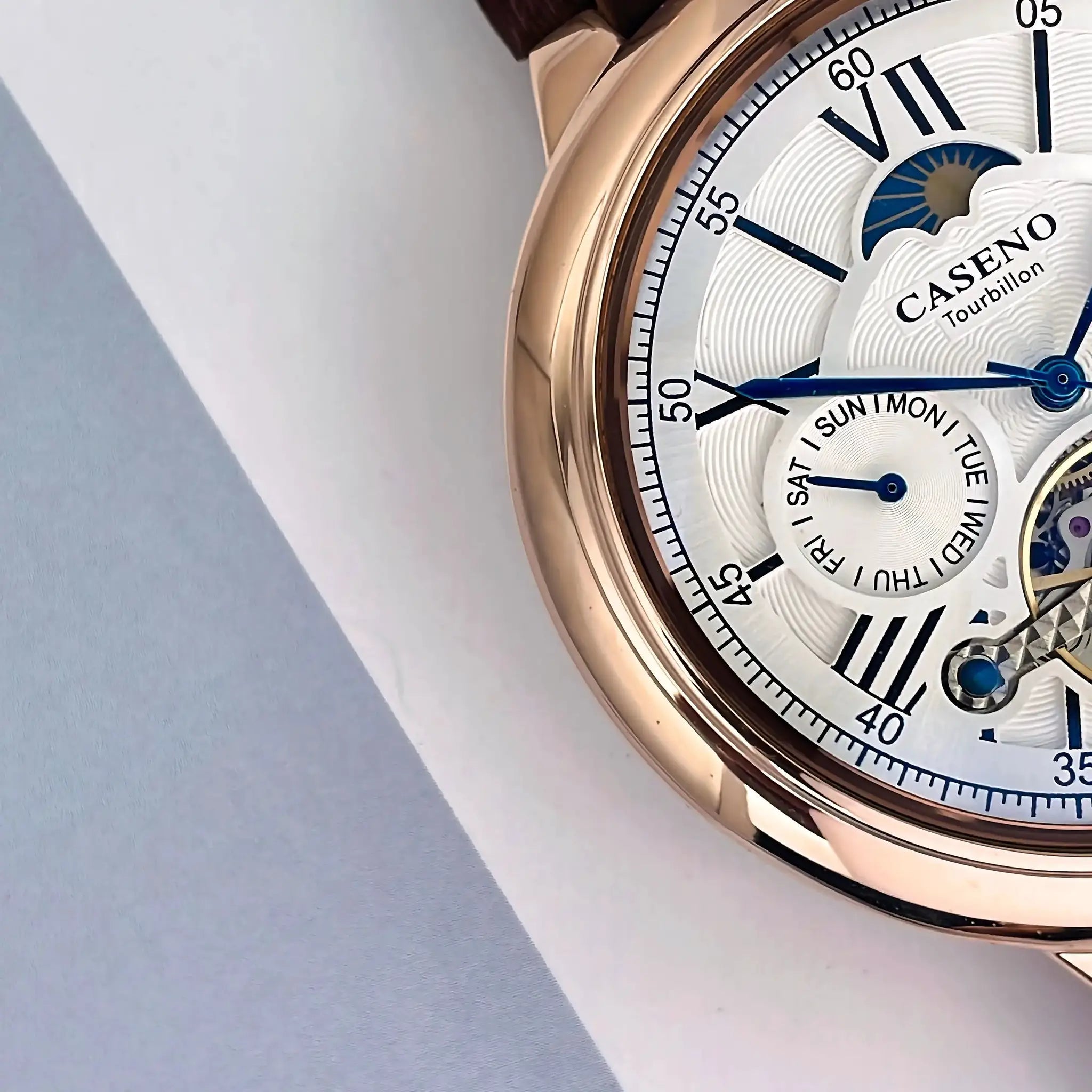 CASENO Star Roman Grand men's automatic tourbillon watch with white dial, rose-gold case and blue hands