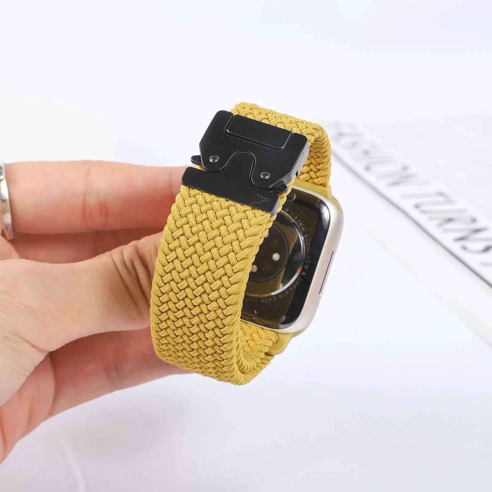 Parachute Apple Watch strap mustard yellow braided nylon with black metal clasp