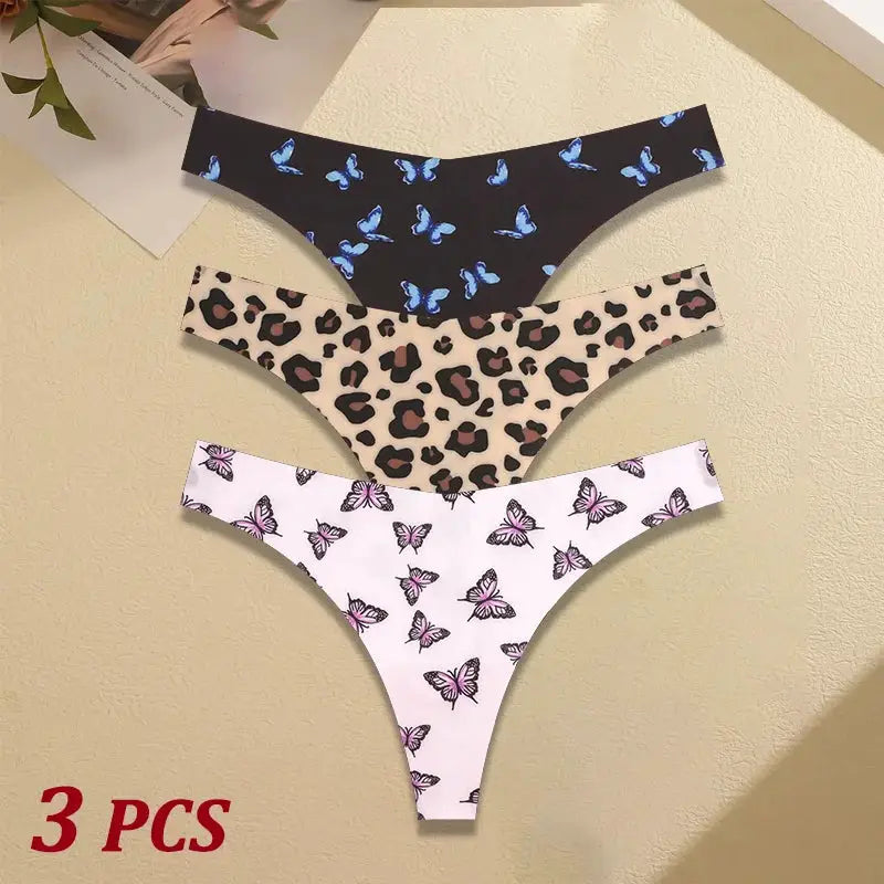 3 pcs Simples Market women's seamless thongs: leopard print, blue butterfly on black, and pink butterfly prints.
