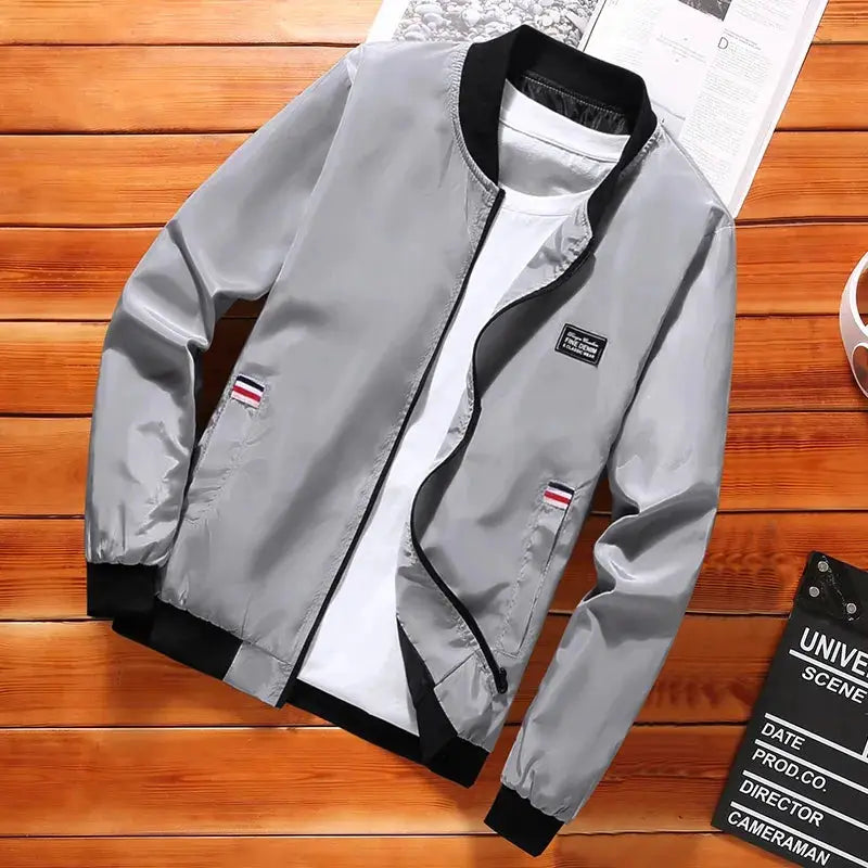 Men's lightweight windbreaker jacket in gray with black cuffs, front zipper and pockets, Simples Market