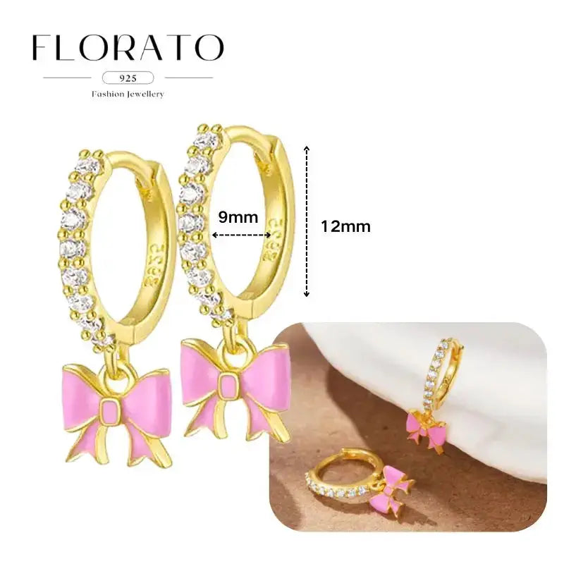 Geometric gold-tone hoop earrings with crystal rim and pink bow charms, Florato 12mm hoops (pair)