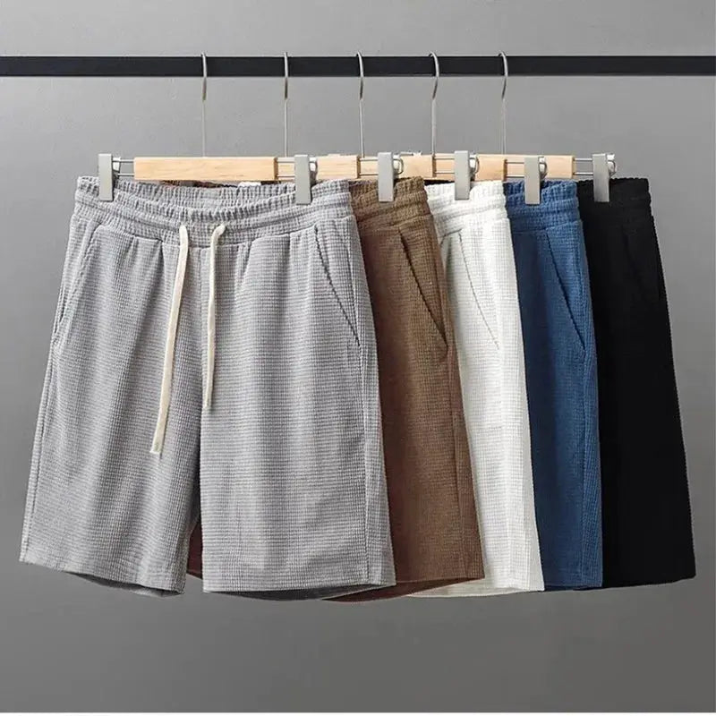Men's shorts by Simples Market with waffle texture, mid-waist drawstring, knee-length, 6 colorways.