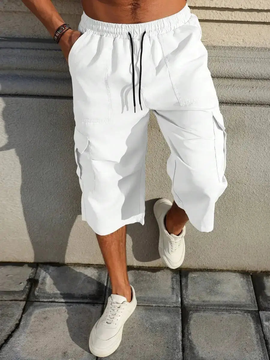 Manfinity Homme white cargo shorts with drawstring, side cargo pockets, knee-length baggy fit