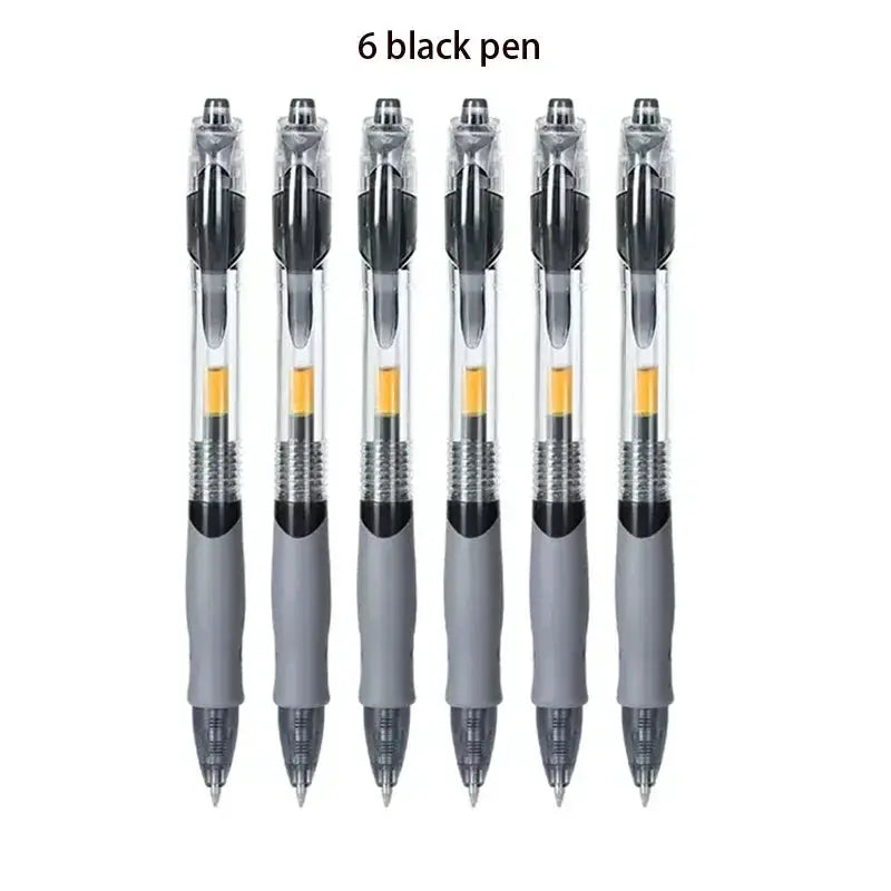 Six Simples Market retractable gel pens with translucent barrels and grey grips, black ink.