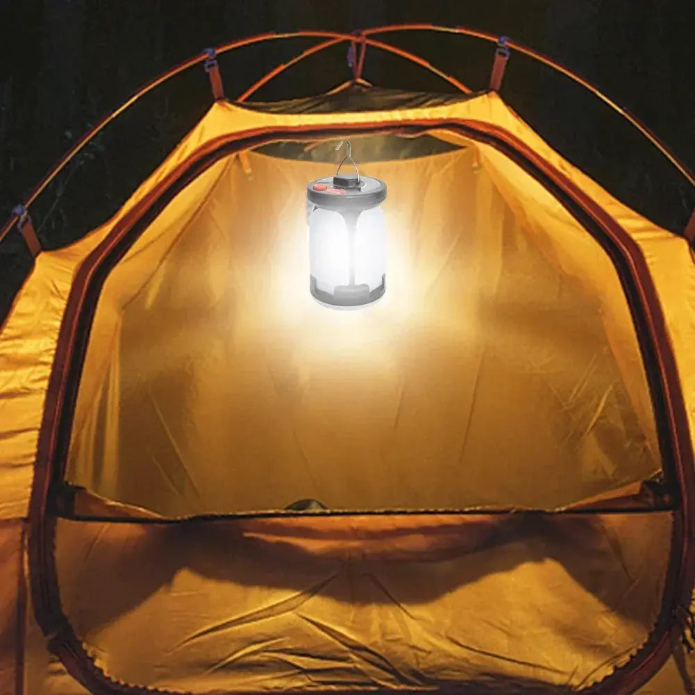 LED Leaf Camping Lamp Simples Market, hanging inside a tent with bright glow, USB rechargeable.