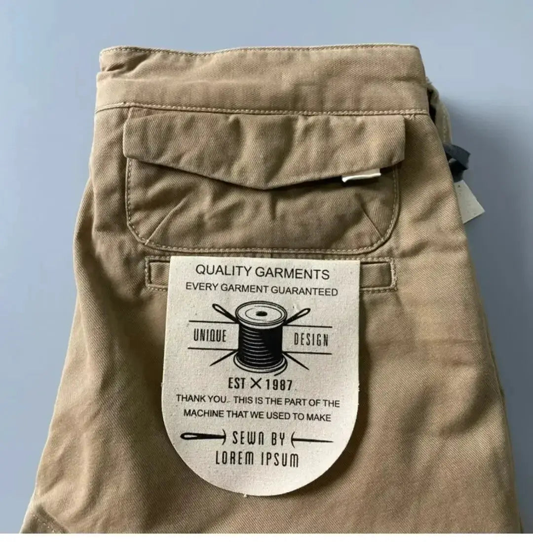 Men's khaki cotton cargo pants with back flap pocket, loose straight-leg fit.