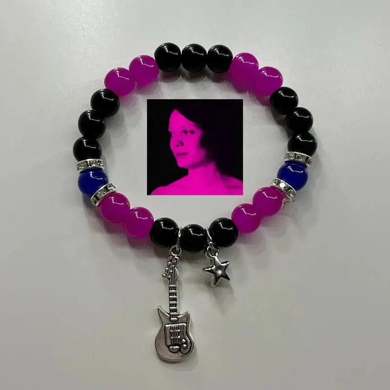 2-Piece beaded bracelet set with black, pink and purple beads, blue accents, guitar and star charms, photo centerpiece