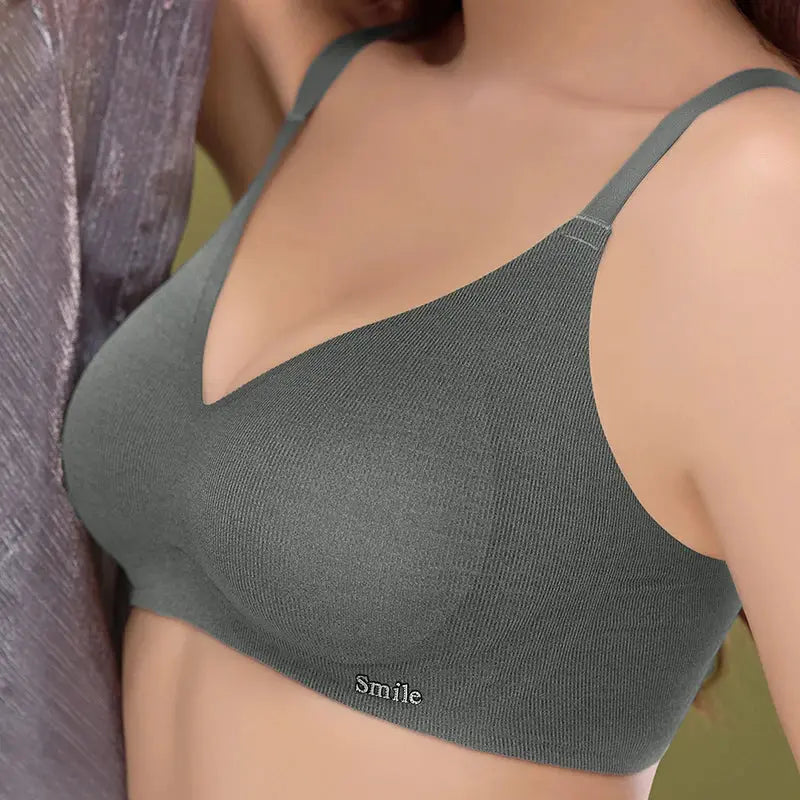 Simples Market latex cup bra, green-gray soft-support bralette with V-neck and Smile logo.