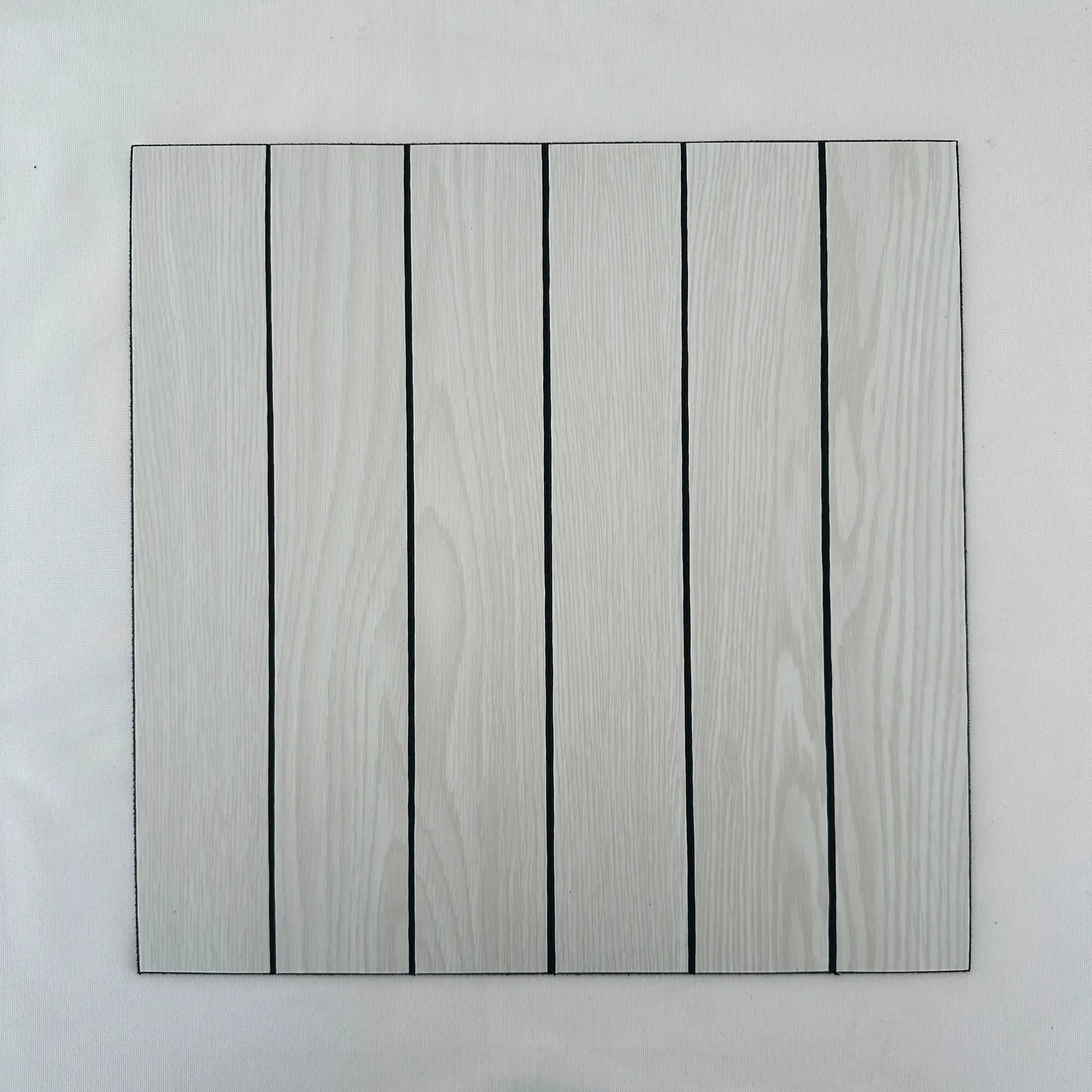 Self-adhesive wallpaper panels with faux wood grain in light gray by Simples Market