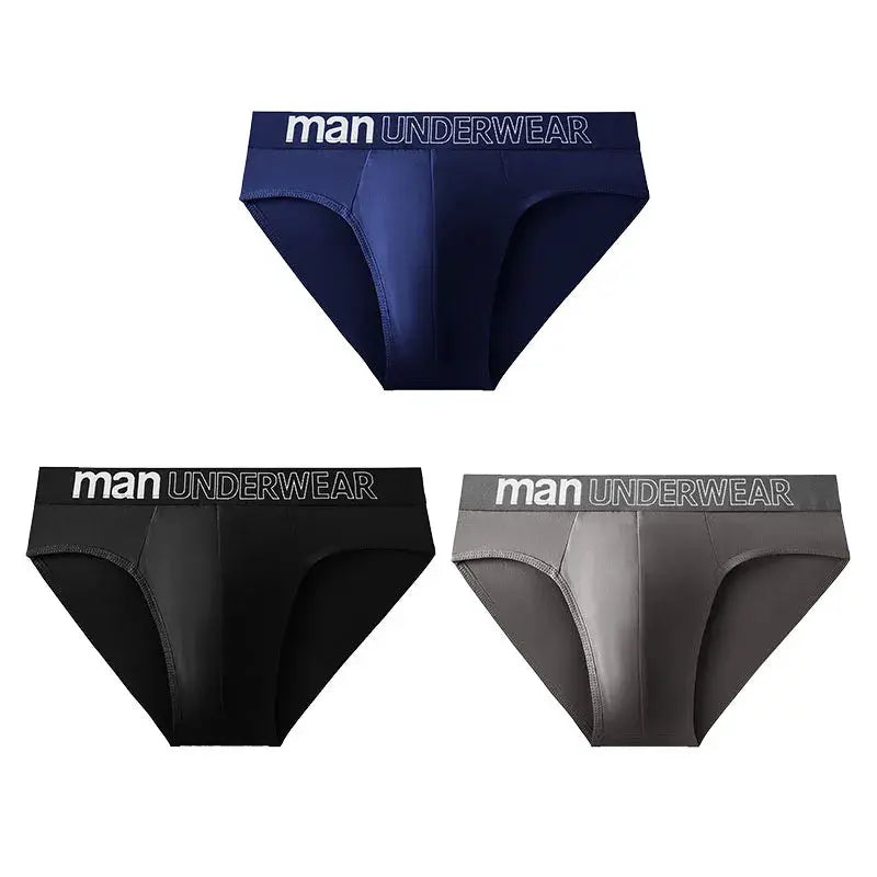 3-pack men's briefs with MAN UNDERWEAR waistband in navy, black, and gray.