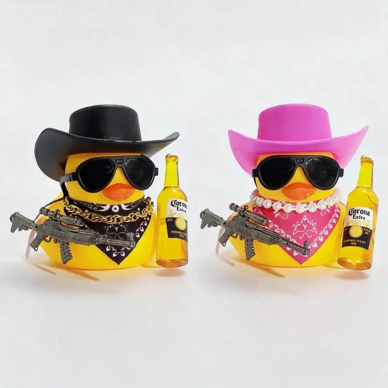 Cowboy rubber duck car ornament pair by Simples Market; yellow ducks with black/pink hats and Corona beer