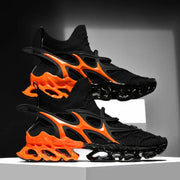 Pair of men's black knitted sneakers with bright orange sculpted sole