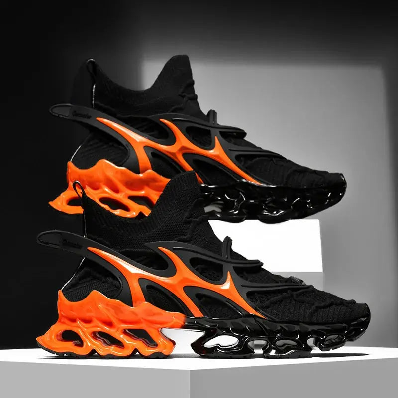 Pair of men's black knitted sneakers with bright orange sculpted sole