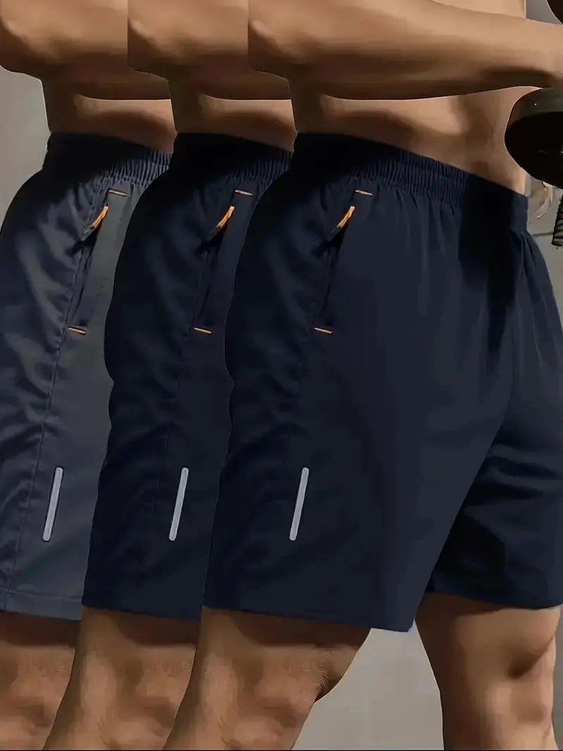 Men's navy sports shorts with elastic waist, orange zipper pockets and reflective leg stripes (set of 3)