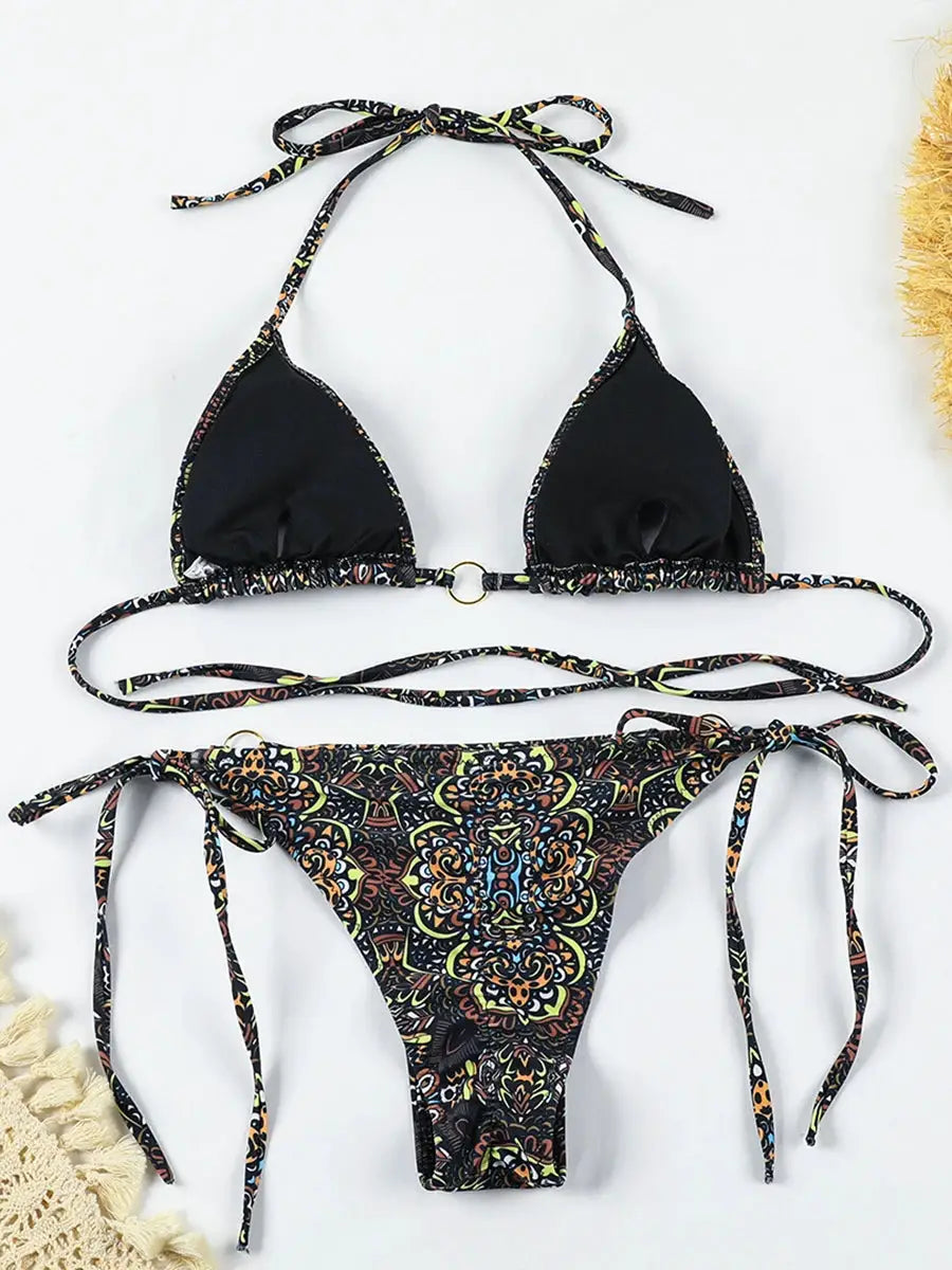 Simples Market two-piece bikini set; black triangle top with colorful trim and printed side-tie bottoms