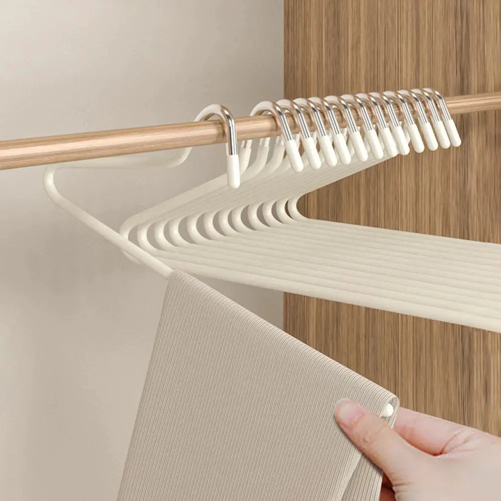 Goose-shaped pants hangers, 30pcs by Simples Market; white plastic with metal hooks and anti-slip clips